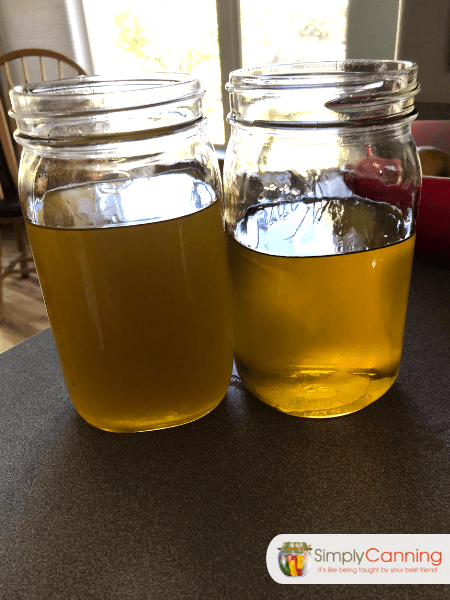 Canning jars filled with dandelion infused oil.