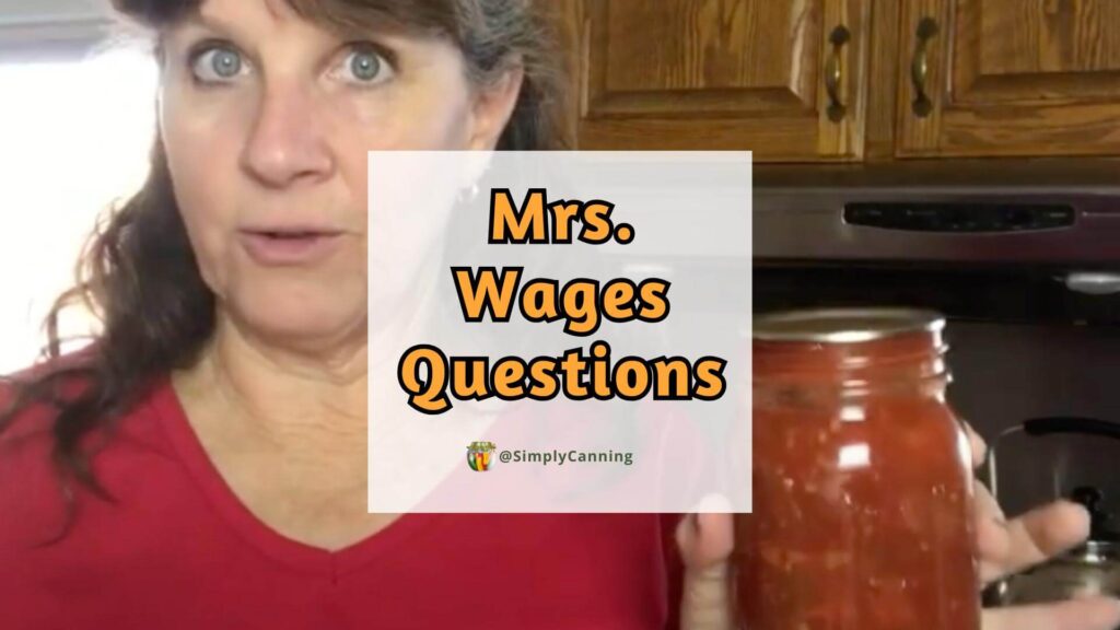 Sharon holding a jar of salsa.