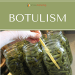 Packing jars with green beans and removing the bubbles.