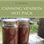 Two quart jars filled with deep red venison.