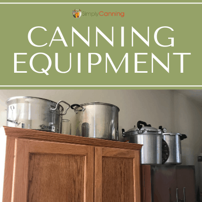 Large pieces of canning equipment stored on the top of the shelving units.