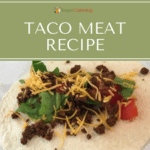 Taco meat sprinkled with cheese and other toppings on a flour tortilla.