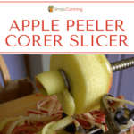 A peeled apple being cored and sliced on the apple peeler corer slicer tool.
