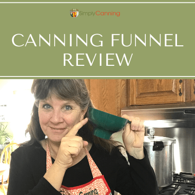 Sharon standing in her kitchen and pointing to her dark green plastic canning funnel.