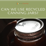 Holding a sealed canning jar with a flat Ball lid sealed on top of it.