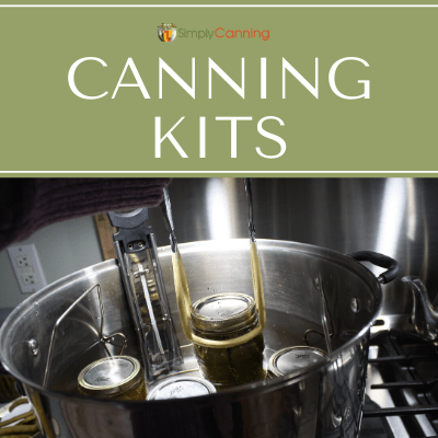 Jar lifting tool in action, just one of the things included in a canning kit!