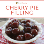 A pie plate filled with large cherries in a pie filling mixture.