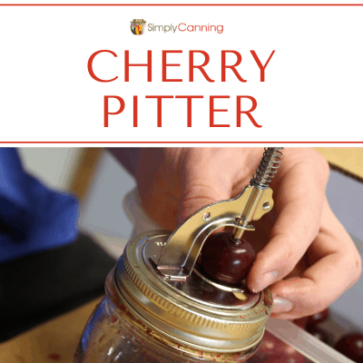 Using a the top of jar cherry pitter to remove a pit from a cherry.