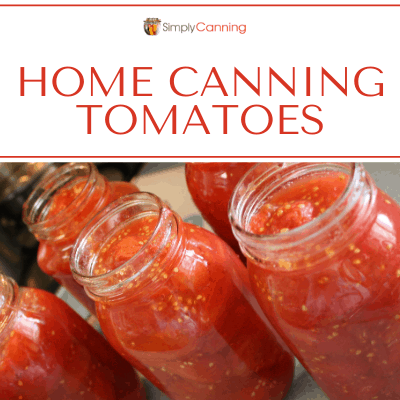 Quart jars filled with juicy tomatoes.