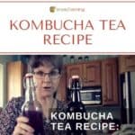 Sharon holding a bottle of kombucha.