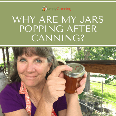 Sharon pressing down on sealed canning jar lid.