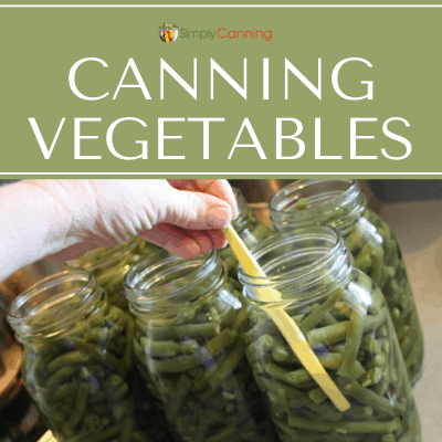 Filling jars with green beans.