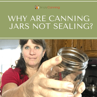 Sharon holding an empty glass canning jar.