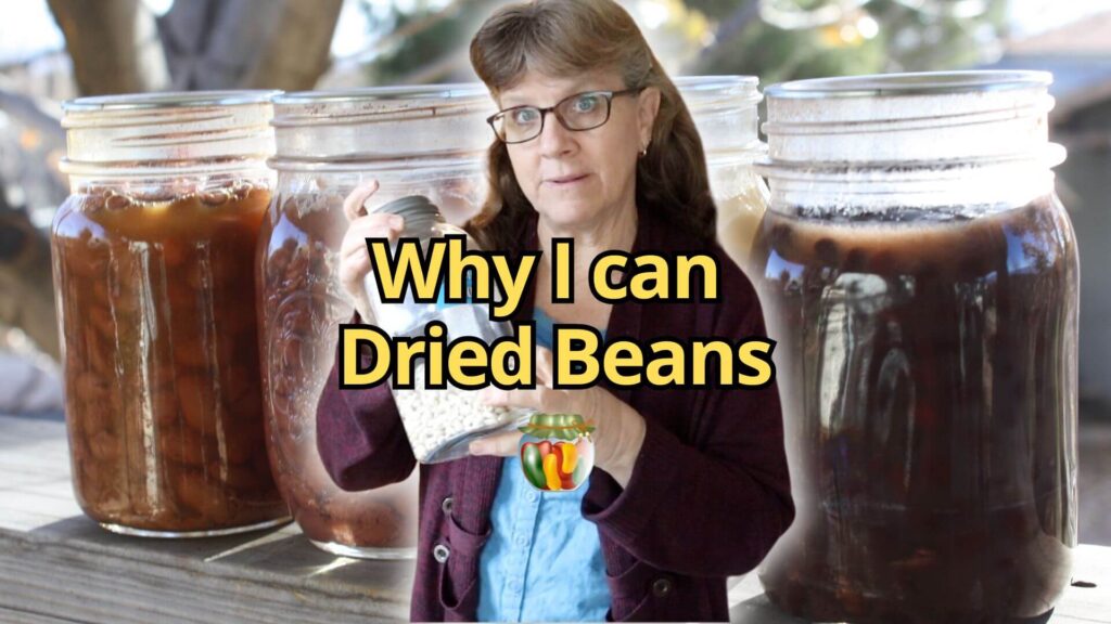 Sharon holding a jar of dried beans with canned beans behind her.