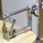 Empty apple peeler corer slicer tool attached to the countertop and waiting to process apples.