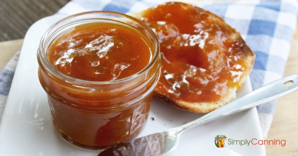 Delicious apricot jam smothered over an English muffin.