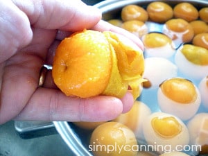 Washing and peeling an apricot.