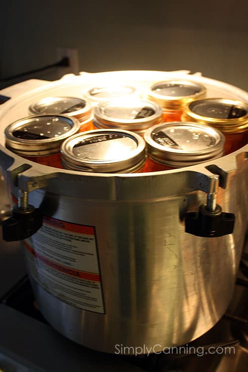 Jars of carrots in the pressure canner.