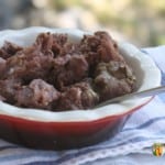 Cooked cubed venison in a glass bowel.