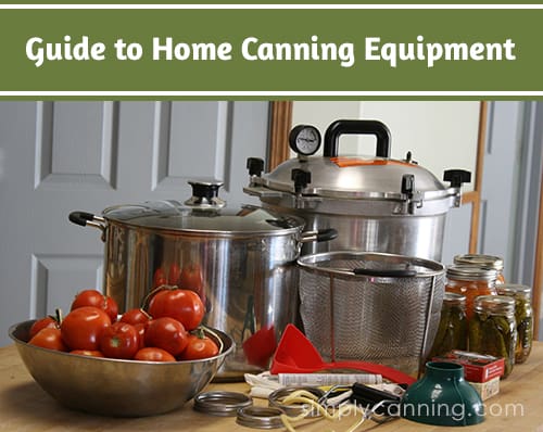 Water bath and pressure canners sitting on the countertop surrounded by other canning equipment.