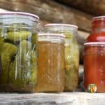 Jars of colorful home canned food.