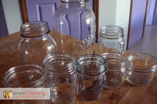 Open canning jars featuring both wide mouth and regular mouth designs.