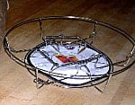 A canning, rack is necessary to keep jars off the bottom of the waterbath.
