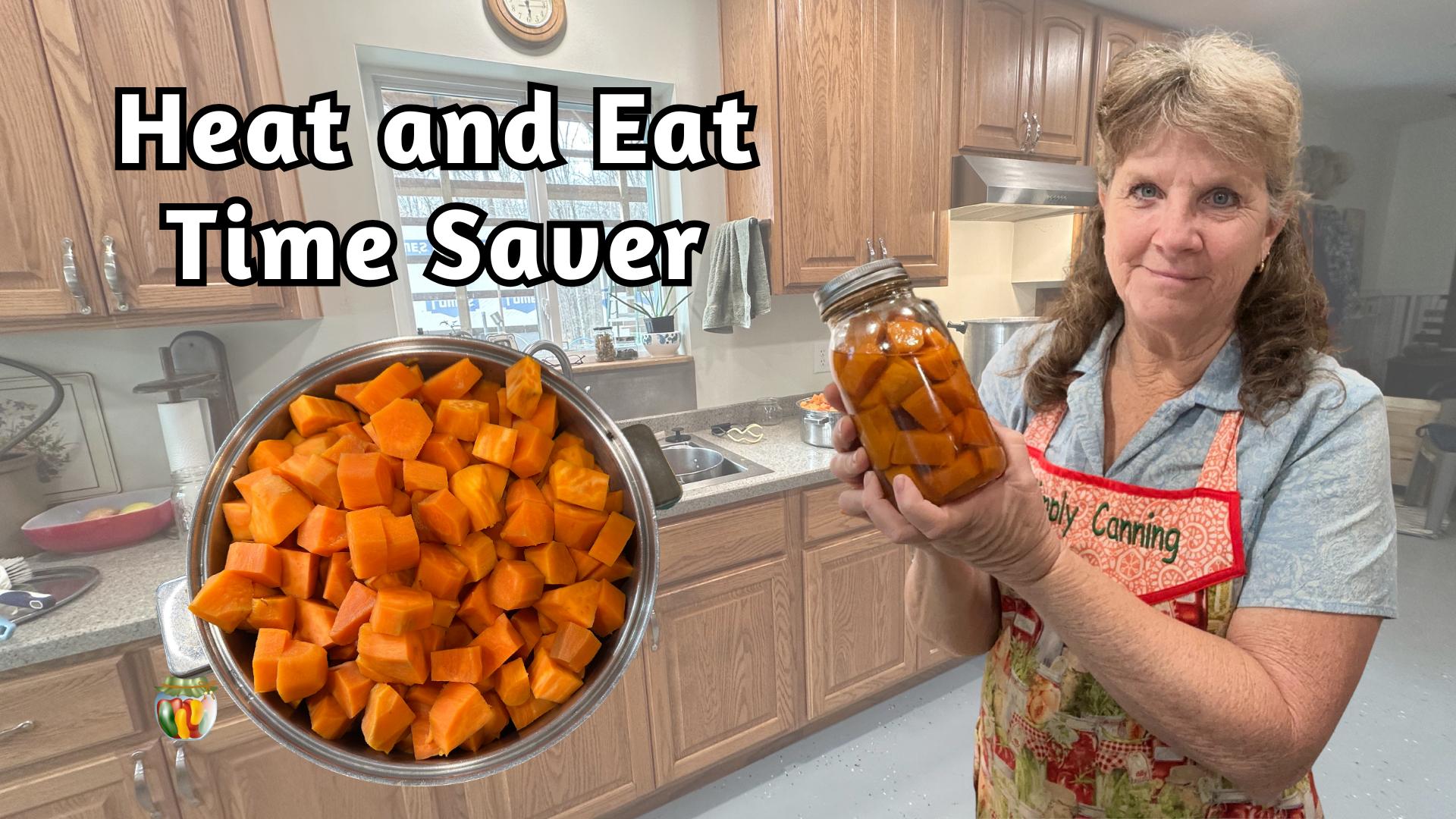 Kitchen with Sharon holding a jar of sweet potatoes, a pot of cubed sweet potatoes to the side. 
