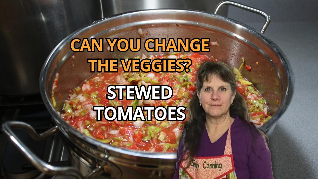 Sharon in front of a big pot of stewed tomatoes.