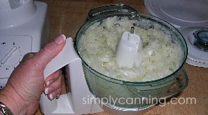 Chopping onions in a food processor.