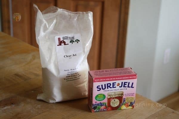 A package of Clear Jel sitting next to a package of Sure Jell.