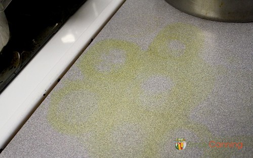 Yellowish ring stains on the countertop.