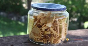 A jar filled with soft dehydrated apple slices
