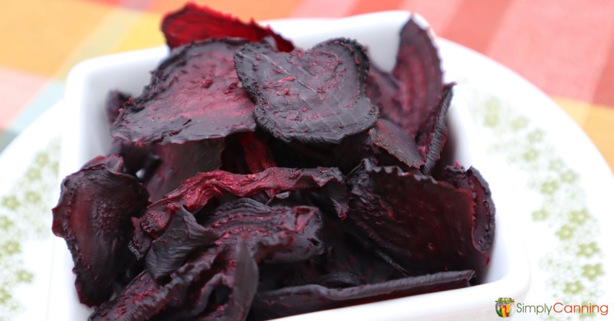 Dried beet slices in a white bowl.