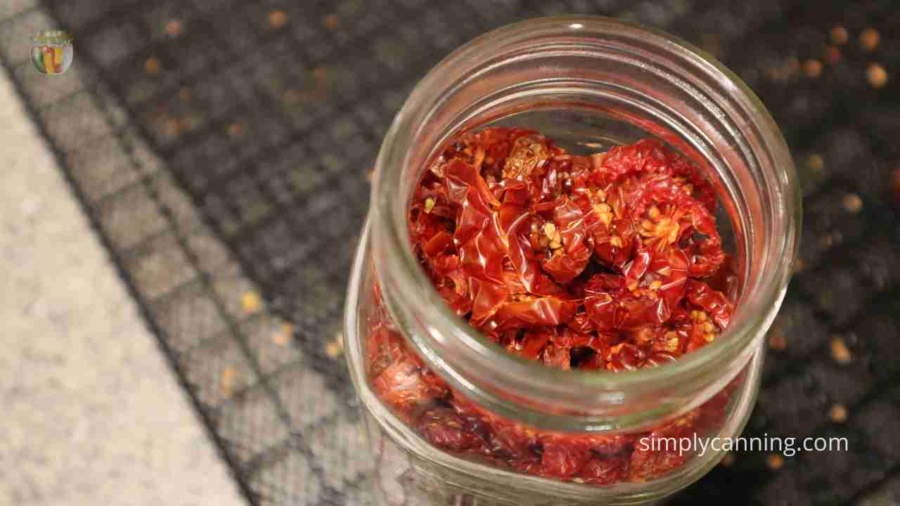 Dehydrated tomatoes in a jar.