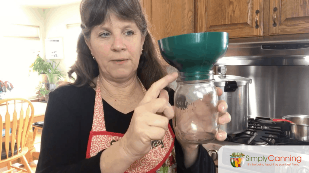 Canning funnel with a big hole or opening in the bottom.