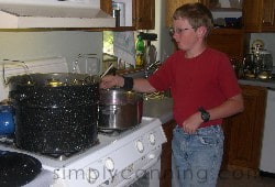 My son Garrett helping me make jam.