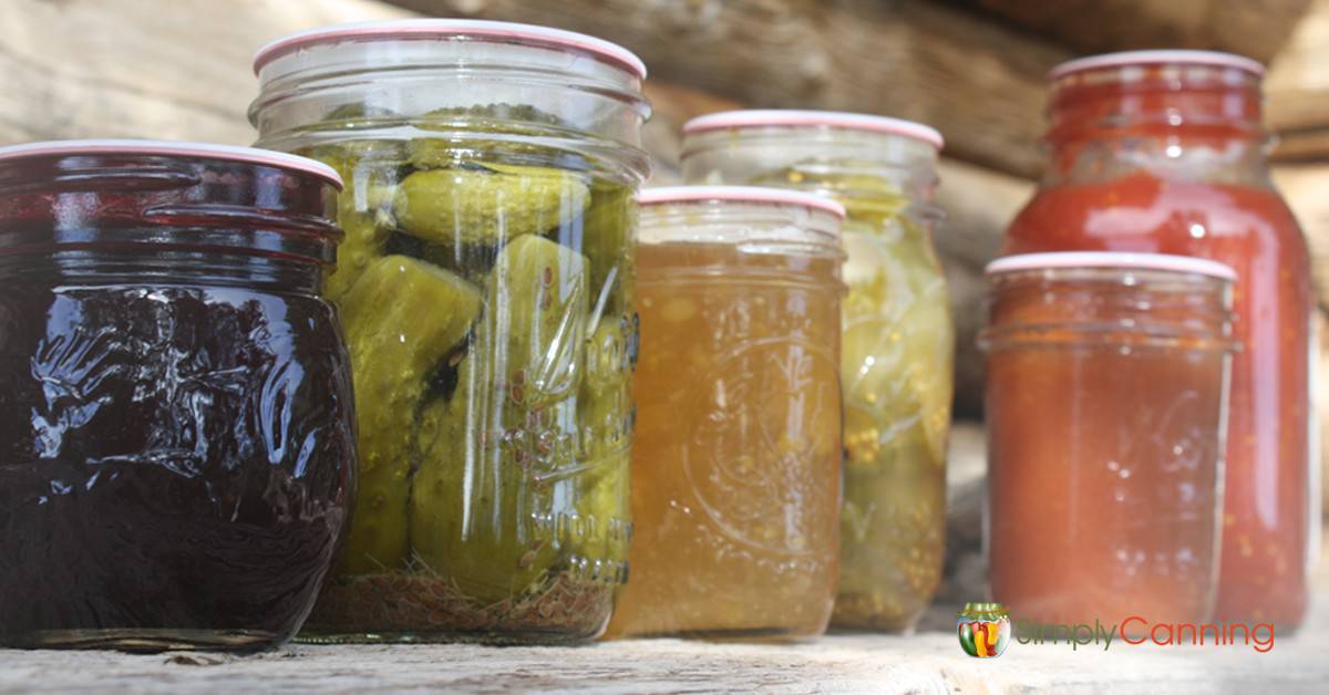 Canning jars of various foods.