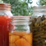 Jars of home canned food that have lost liquid during processing.