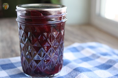 A small quilted canning jar filled with pickled beets.