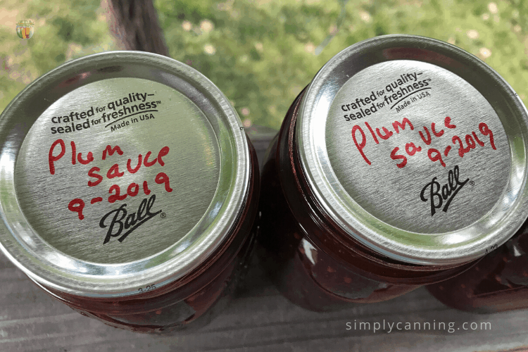 Two labeled jars of plum sauce.
