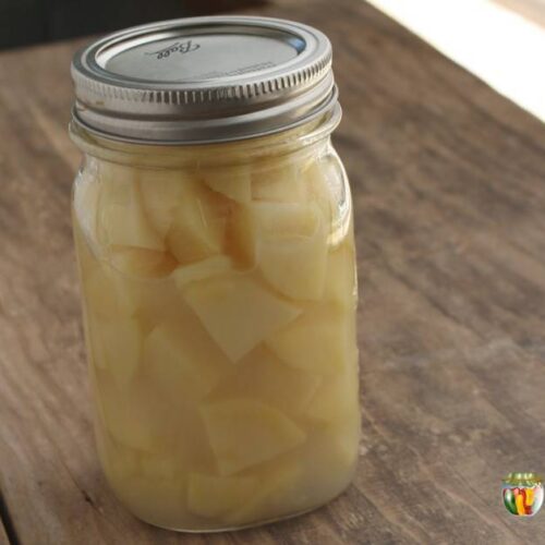 A jar of home canned potato chunks.