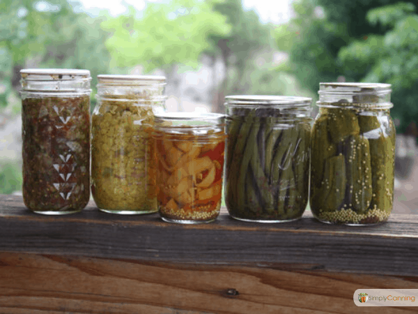 Jars of home canned and pickled vegetables.