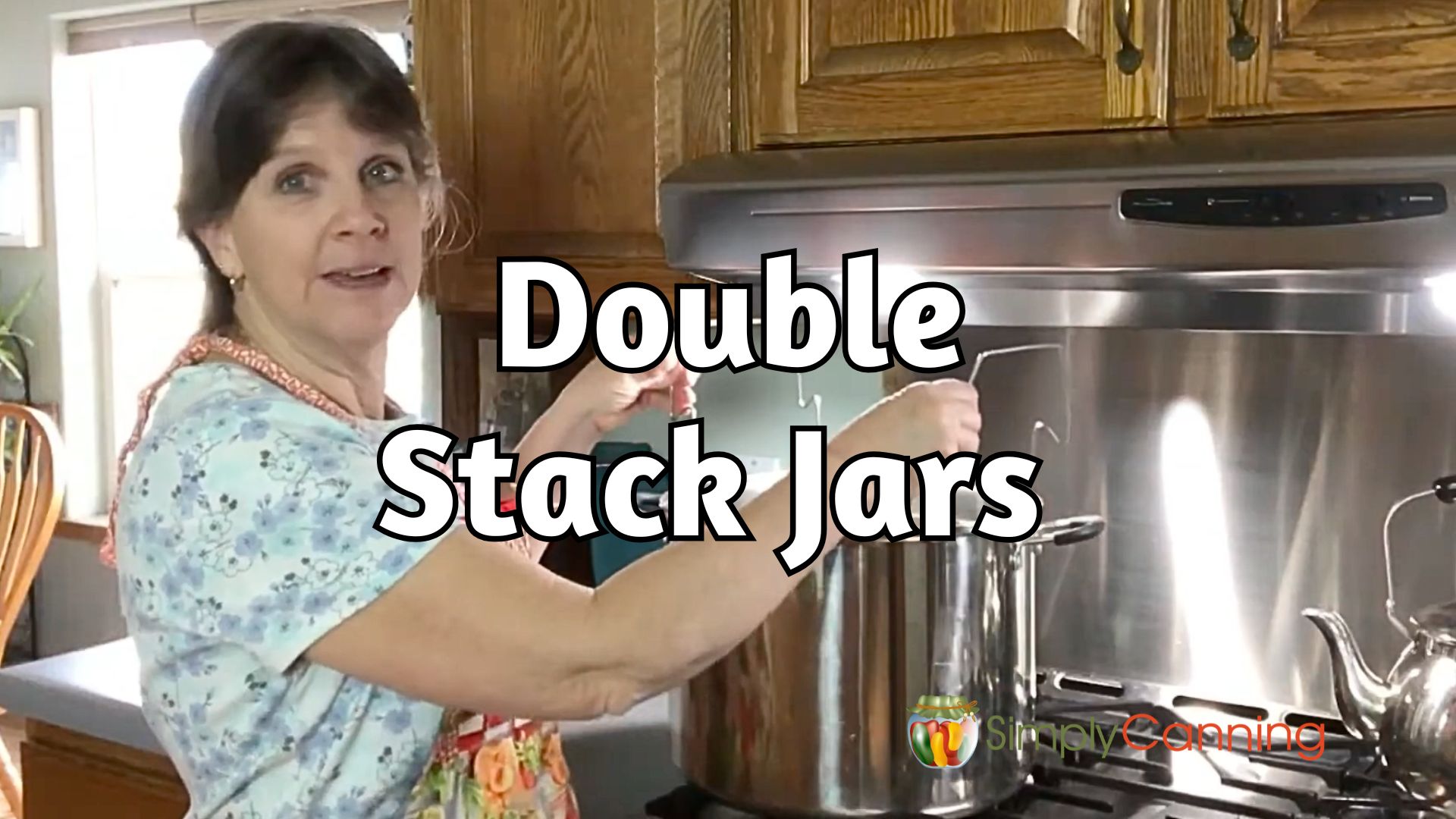 Sharon showing a water bath rack discussing double stacking jars.