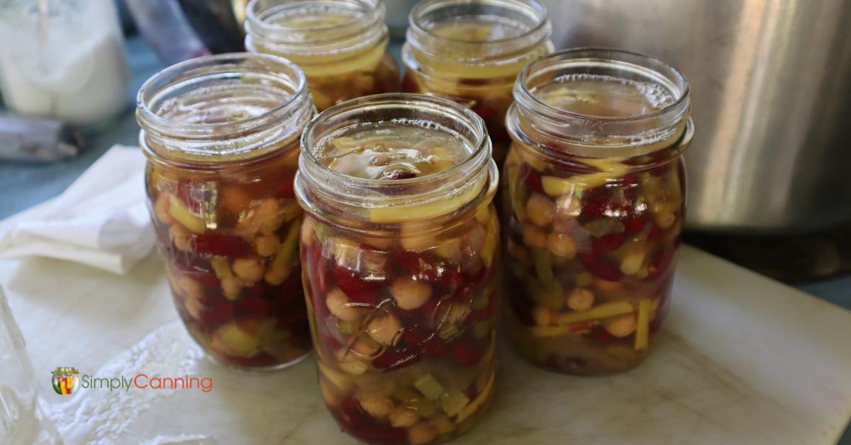 3 bean salad in 5 pint jars, no lids have been placed yet.