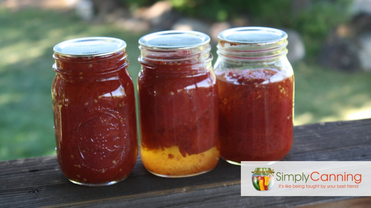 3 jars of tomatoes side by side, one with floating, one with liquid loss and one just right.