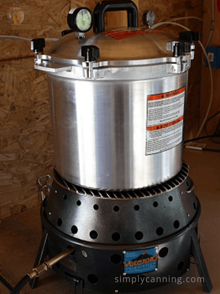 Pressure canner sitting on the Volcano Stove Grill.