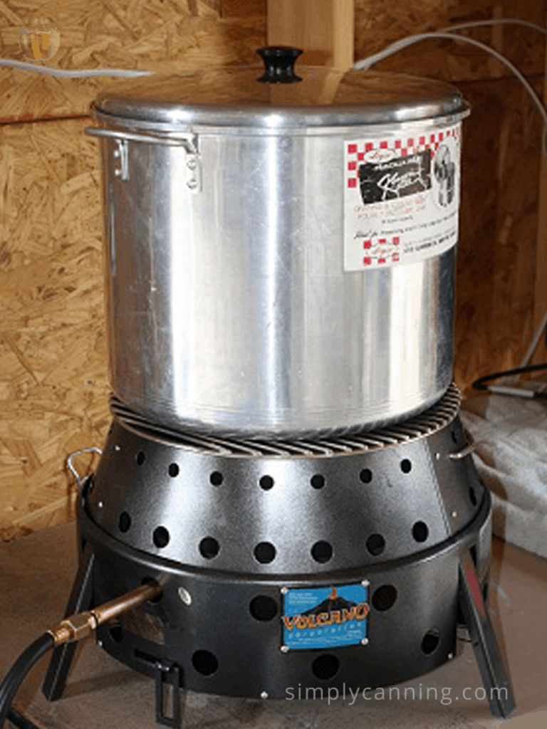 Water bath canner sitting on the Volcano Stove Grill.