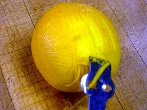 Zesting a fresh orange. 